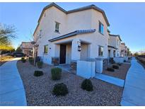 Inviting two-story home with low maintenance landscaping and a covered entryway at 846 Star Estates Ave, North Las Vegas, NV 89086