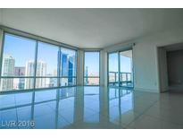 Bright living room with floor to ceiling windows and city views at 222 Karen Ave # 2601, Las Vegas, NV 89109