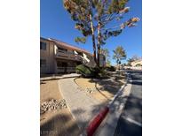 Building exterior with walkway and landscaping at 3761 Desert Marina Dr # 81, Laughlin, NV 89029