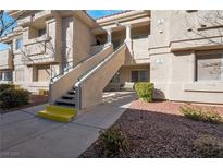 Building exterior with stairs and landscaping at 1518 Jenny Linn Dr # 105, Henderson, NV 89014