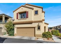 Beautiful two-story home with attached garage and landscaping at 9916 Fallowdeer Ct, Las Vegas, NV 89149