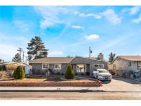 Ranch style home with landscaped yard and driveway at 1920 Wendell Ave, Las Vegas, NV 89101