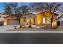 Beautiful desert home with stone accents and mature landscaping at 7307 Iron Oak Ave, Las Vegas, NV 89113