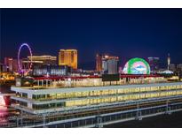 Night view overlooking Las Vegas skyline and race track at 205 E Harmon Ave # 1012, Las Vegas, NV 89169