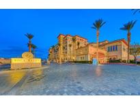 Boca Raton Condo exterior at night, showing building entrance and landscaping at , Las Vegas, NV 89123