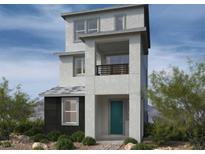 Contemporary three-story home with teal door and balcony at 1521 Bat Hawk St, Las Vegas, NV 89138