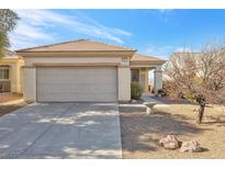 Single-story home with attached garage and desert landscaping at 2255 Potter Lake Ave, Henderson, NV 89052