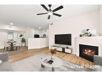 Spacious living room with fireplace and virtual staging at 3400 Cabana Dr # 1108, Las Vegas, NV 89122