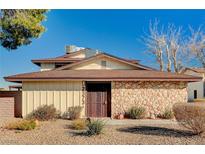 Inviting exterior with stone accents and landscaped yard at 2373 Cardiff Ln # A, Las Vegas, NV 89108