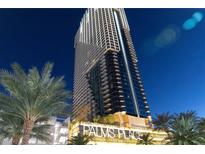 Night view of Palms Place highrise building, modern architecture, city lights at 4381 W Flamingo Rd # 2903, Las Vegas, NV 89103