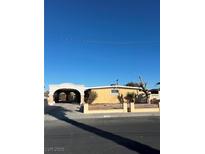 Ranch style home with carport and landscaped yard at 4804 Sacks Dr, Las Vegas, NV 89122