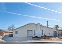 Single story home with front yard and driveway at 6229 Cromwell Ave, Las Vegas, NV 89107