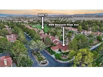 Stunning aerial view of the neighborhood highlighting the house's location near Hole 7 of the golf course at 8199 Pinnacle Peak Ave, Las Vegas, NV 89113