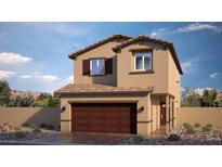 Two-story house with brown garage door and tan exterior at 9986 Ullom Dr # 14, Las Vegas, NV 89141