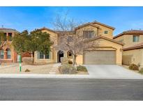 Two-story house with a large garage and landscaping at 1836 La Calera Ave, North Las Vegas, NV 89084