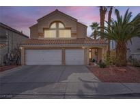 Two-story house with attached two-car garage at 78 Sea Holly Way, Henderson, NV 89074