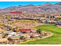 Aerial view of a residential community near mountains and golf course at 2589 Sumter St, Henderson, NV 89052