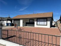 Newly renovated single story home with a modern facade and attractive landscaping at 3600 Broadway Ave, North Las Vegas, NV 89030