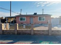 Updated single story home with a fenced front yard at 1972 H St, Las Vegas, NV 89106