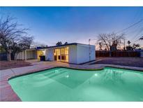 Updated home with a sparkling pool and spacious backyard at 1976 Caballero Way, Las Vegas, NV 89169
