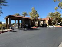 Gated community entrance with covered entryway and ample parking at 2200 S Fort Apache Rd # 1207, Las Vegas, NV 89117