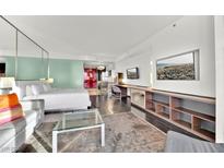Modern bedroom with a king-size bed and city views at 4381 W Flamingo Rd # 3519, Las Vegas, NV 89103