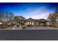 Beautiful single-story home with stone accents and a landscaped front yard at 6336 San Gagano Ave, Las Vegas, NV 89131