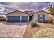 Charming single-story home with a three-car garage and low-maintenance desert landscaping at 4641 Sommerset Ct, Pahrump, NV 89061