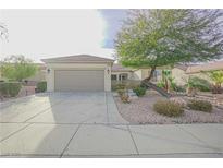 Single-story home with attached garage and landscaped front yard at 2951 Maffie St, Henderson, NV 89052