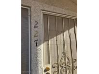 Front door entrance with security screen and address number 227 at 3425 E Russell Rd # 227, Las Vegas, NV 89120