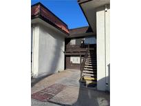 Exterior view of a building with stairs and a small patio area at 1405 Vegas Valley Dr # 398, Las Vegas, NV 89169