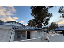 Spanish style home with tile roof and private patio at 2136 Chertsey Dr # A, Las Vegas, NV 89108