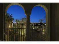 Night view of city skyline from private balcony with arched entryway at 2555 Hampton Rd # 4302, Henderson, NV 89052