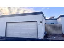 White garage door with address number 2253 visible at 2253 High Dunes Ln, Laughlin, NV 89029