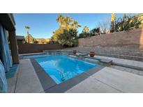 Inviting backyard pool with waterfall features at 2316 Mountain Rail Dr, North Las Vegas, NV 89084