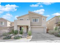 Two-story house with stone accents and landscaped front yard at 2598 Iron Crest Ln, Las Vegas, NV 89138