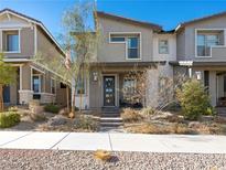 Two story home with gray exterior, landscaping, and walkway at 686 Last Dance Pl, Henderson, NV 89011