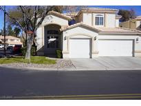 Charming two-story home with a two-car garage and manicured front lawn at 5524 Big Sky Ln, Las Vegas, NV 89149