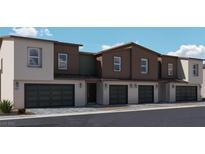 Modern three-unit townhome building with attached garages and desert landscaping at 2558 Petunia Garden Ave # 217, North Las Vegas, NV 89081