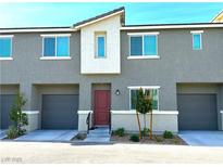 Modern two-story townhome with attached garage and landscaping at 2853 Tahiti Grape Way # 3, Las Vegas, NV 89183