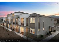 Modern townhome building with contemporary design and attractive landscaping at 6118 Garden Oasis St # Lot 4, Las Vegas, NV 89148