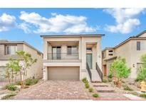 Two-story modern home with attached garage and balcony at 7883 Bethel Heights Ln, Las Vegas, NV 89113