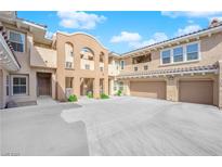 Charming multi-Gathering home with two car garage and neutral earth tone colors, perfect for luxury living at 11870 Tevare Ln # 2086, Las Vegas, NV 89138