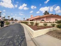 La Mancha II community entrance with gated access and landscaping at 562 Cervantes Dr, Henderson, NV 89014