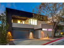 Modern two-story home with sleek design and desert landscaping at 2272 Horizon Light Ct, Henderson, NV 89052