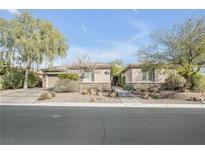 Charming single-story home with desert landscaping and inviting curb appeal in a suburban neighborhood at 7288 Olsen Farm St, Las Vegas, NV 89131