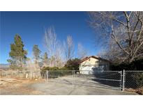 Two-car garage with gated entry at 3941 Dennis St, Pahrump, NV 89060