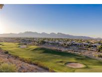 Luxury homes and golf course with scenic mountain backdrop at 9204 Tesoras Dr # 401, Las Vegas, NV 89144