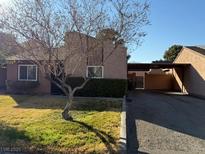 Cute single-story home with a carport and small front yard at 1806 Discus Dr, Las Vegas, NV 89108