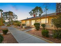 Inviting exterior with landscaped walkway leading to the entrance of the house at 3982 Voxna St, Las Vegas, NV 89119